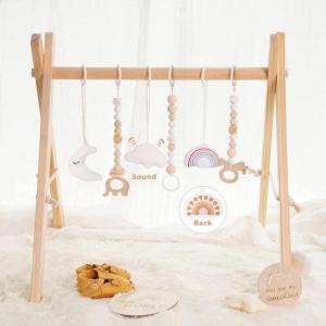 Foldable Baby Play Gym with Mat, Wooden Play Gym with 9 Sensory Toys, Frame Activity Center, Natural Pine Wood, Montessori Toys, Easy to Assemble & Clean, Newborn Gift, Blue Color(Wood Baby Gym)